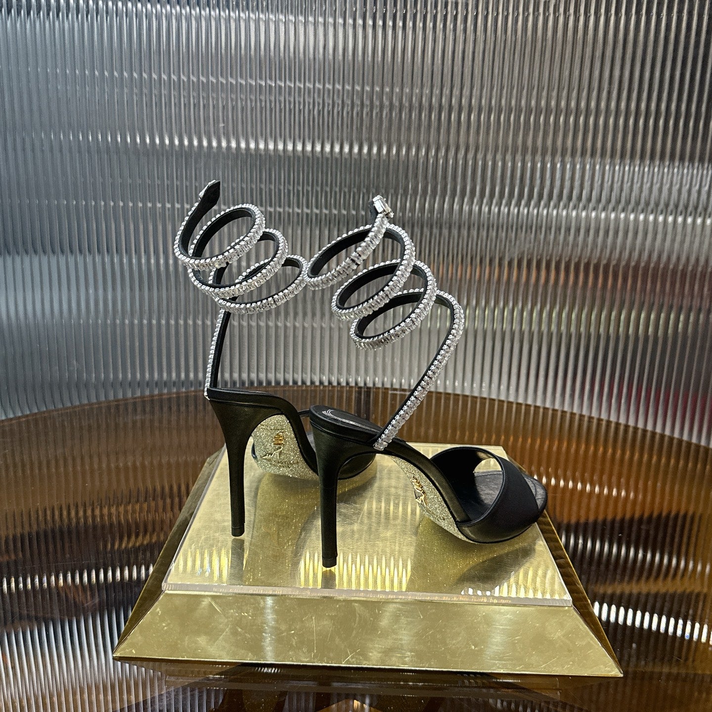 Cleo Spark stiletto sandal in Black Leather with rhinestone embellishments