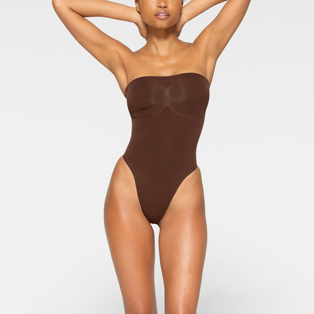 SEAMLESS SCULPT STRAPLESS THONG BODYSUIT