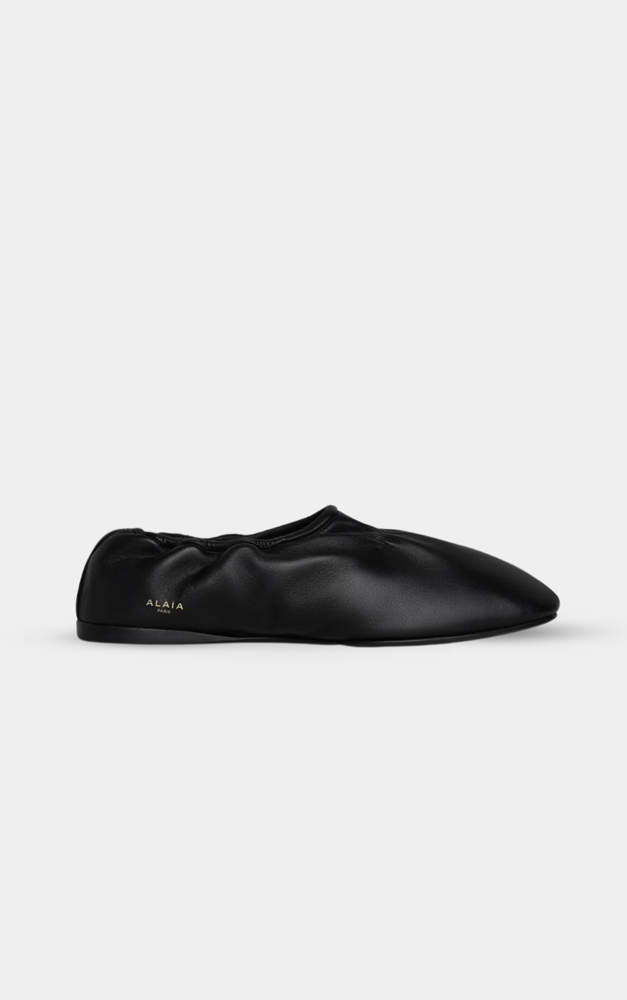ALAÏA NOIR SUPPLE SLIPPERS IN LEATHER
