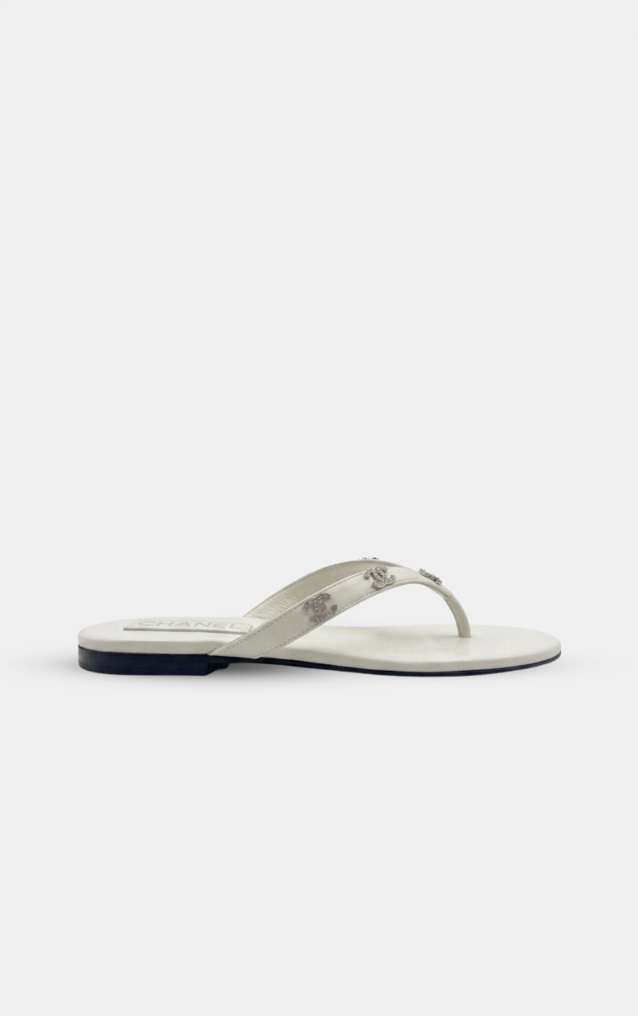 CHANEL White leather rhinestone thong sandals