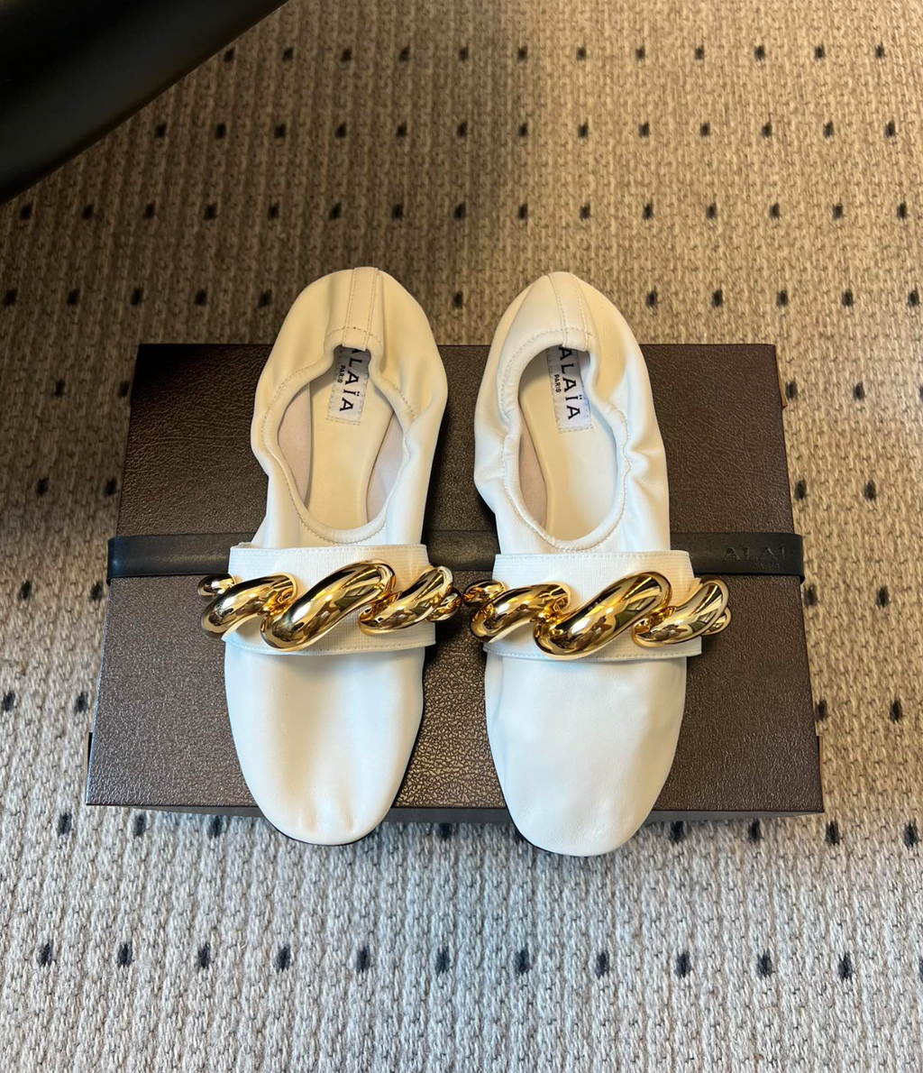 ALAÏA WHITE JEWEL SLIPPERS IN LEATHER