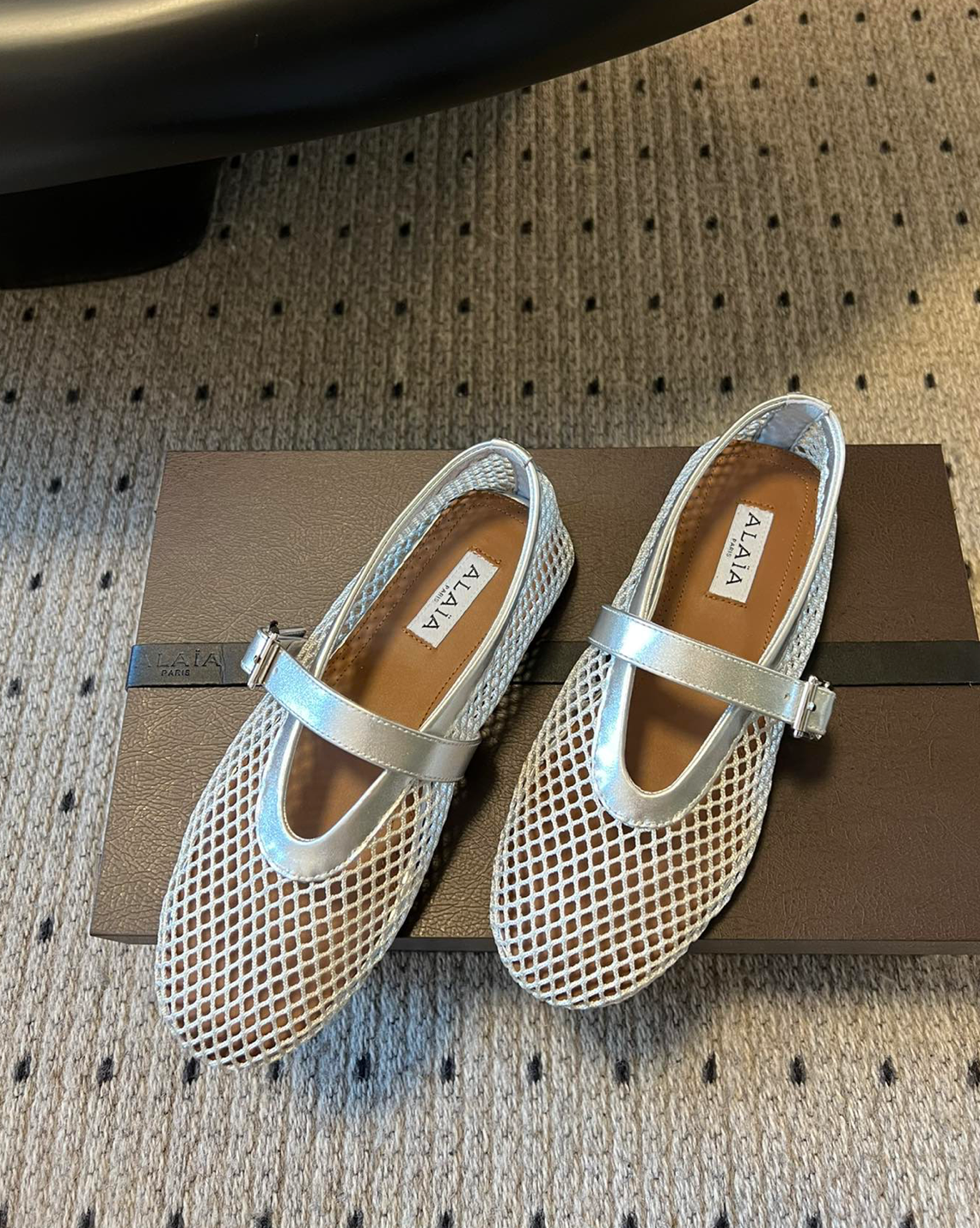 ALAÏA SILVER BALLET FLATS IN FISHNET