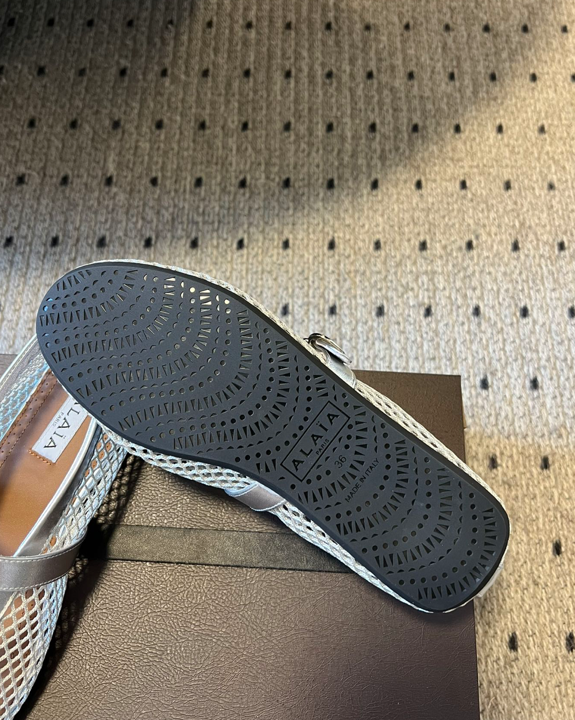 ALAÏA SILVER BALLET FLATS IN FISHNET