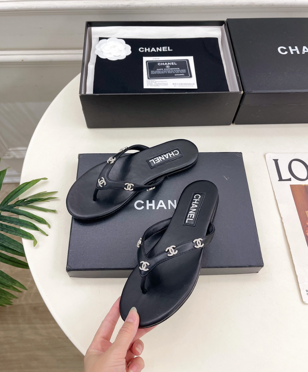 CHANEL black leather rhinestone thong sandals