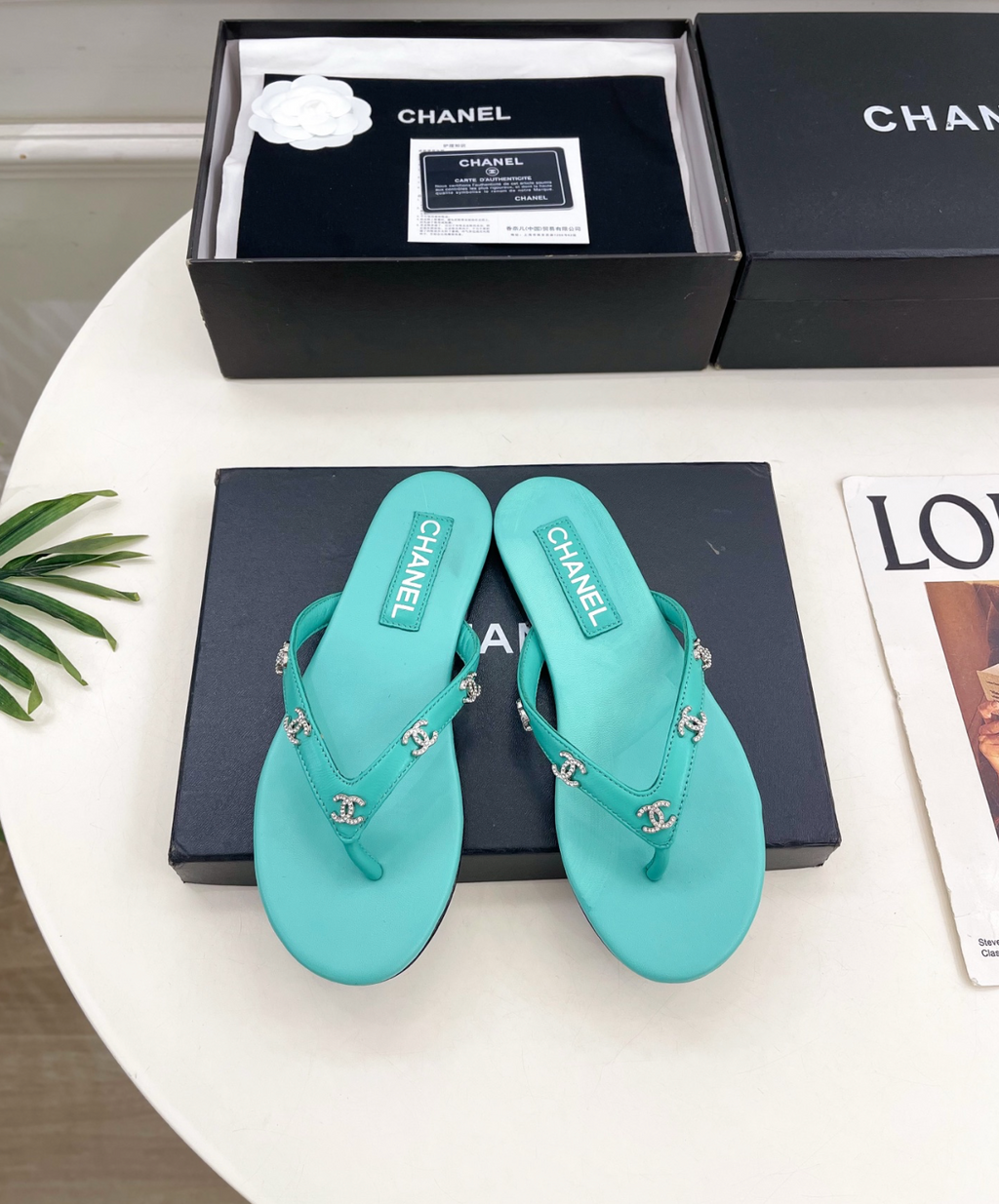 CHANEL Aqua leather rhinestone thong sandals