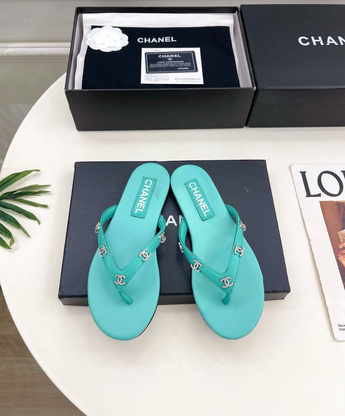 CHANEL Aqua leather rhinestone thong sandals