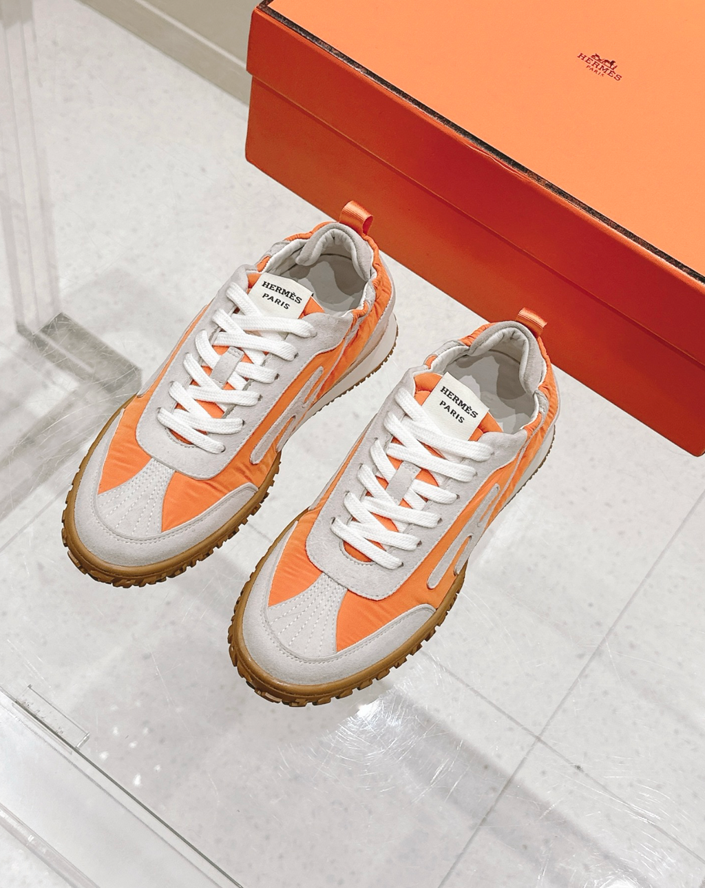 Hermès Jet Orange Sneakers