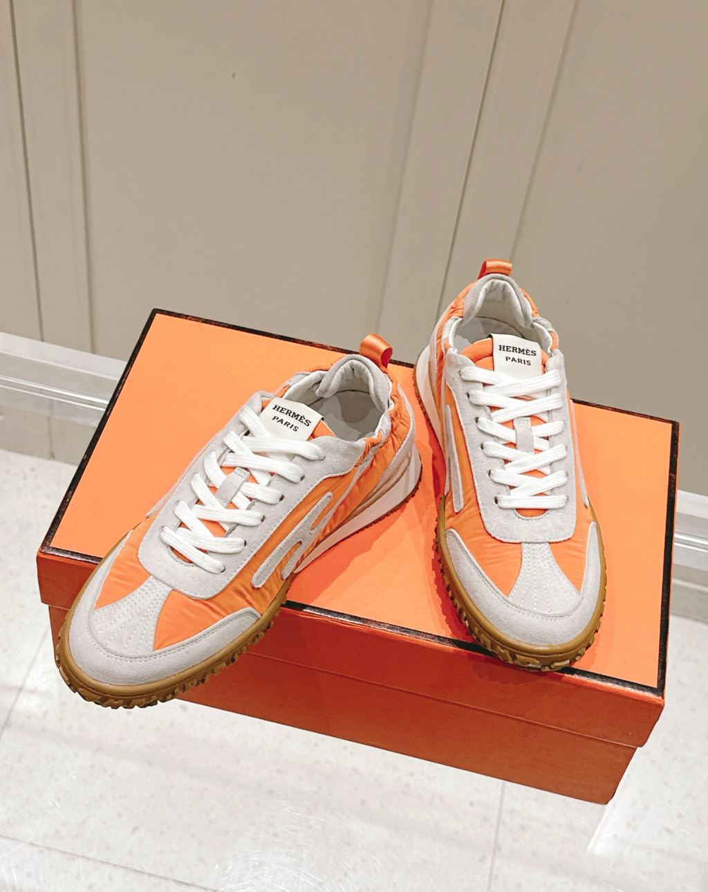 Hermès Jet Orange Sneakers