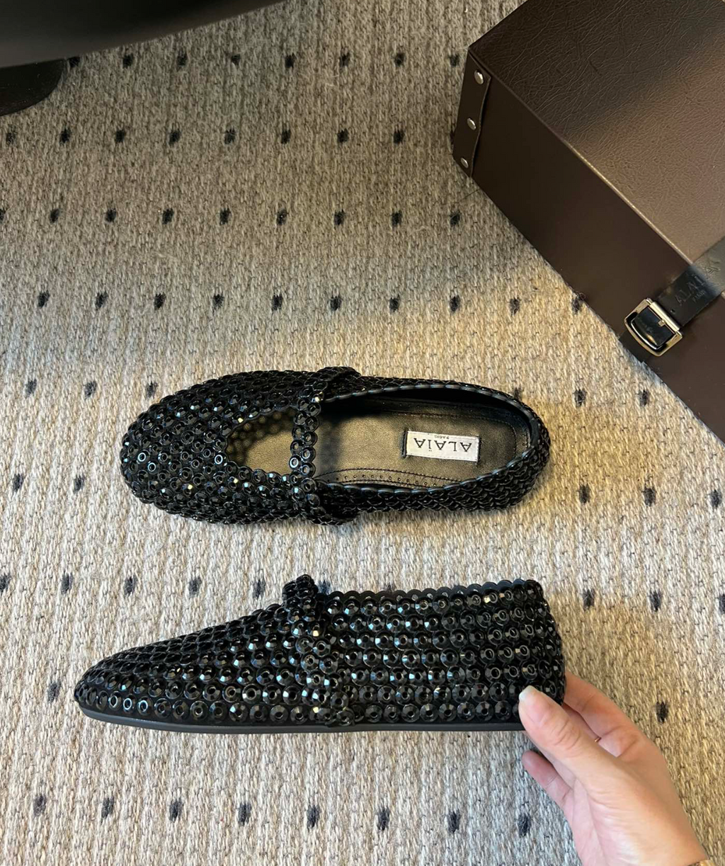 ALAÏA EMBELLISHED BALLET FLAT SHOES IN BLACK