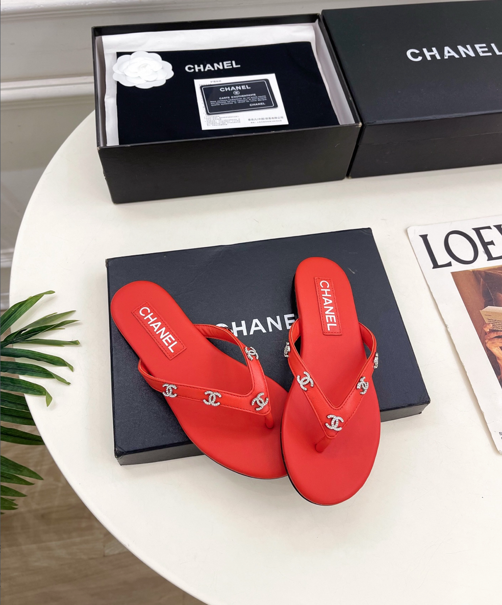 CHANEL Red leather rhinestone thong sandals