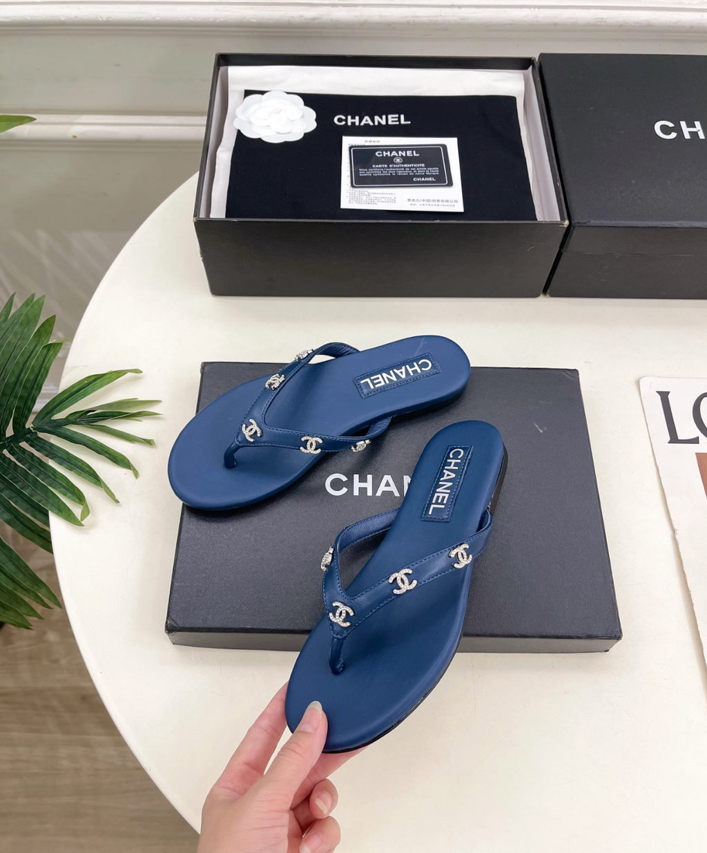 CHANEL Blue leather rhinestone thong sandals
