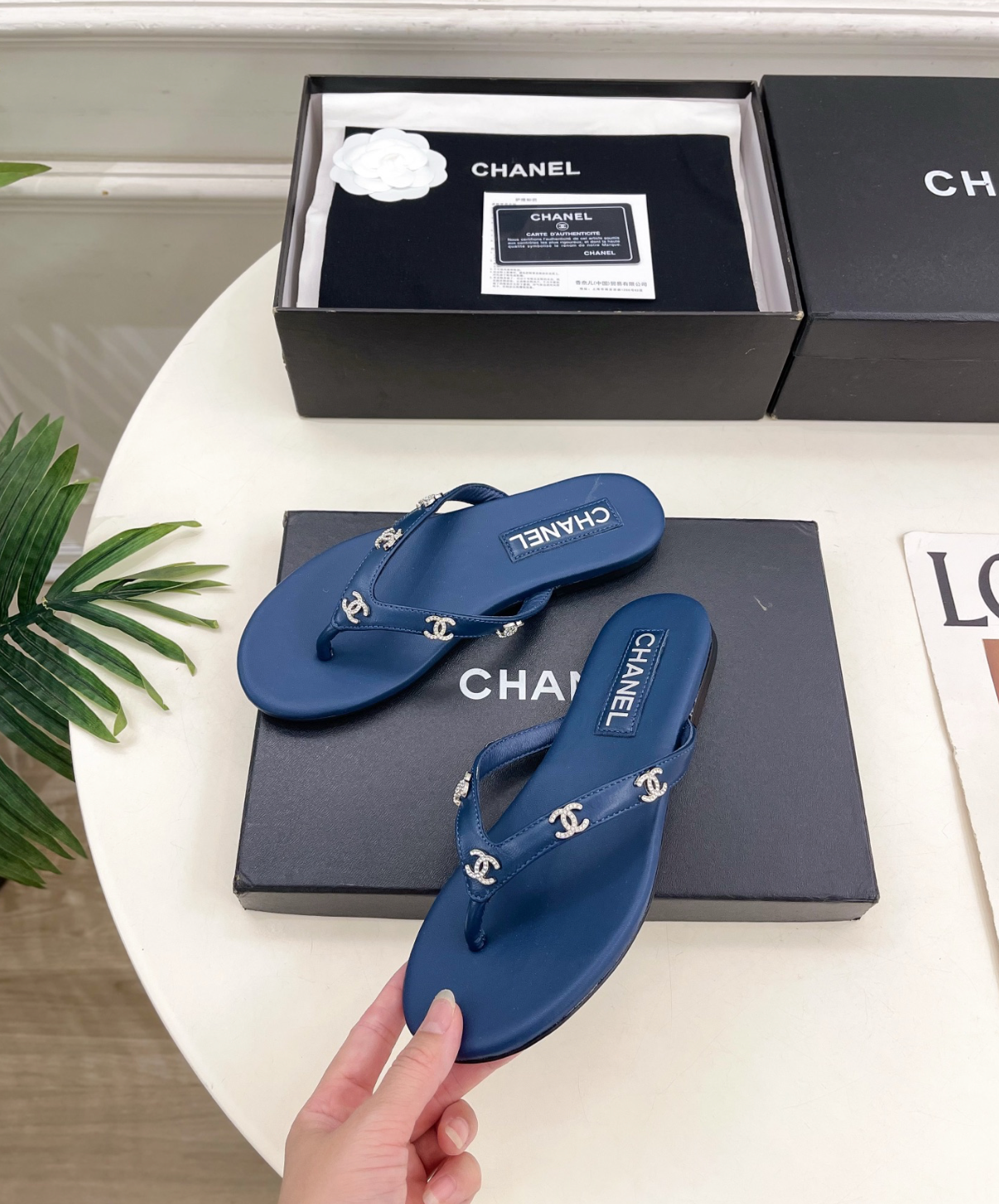 CHANEL Blue leather rhinestone thong sandals