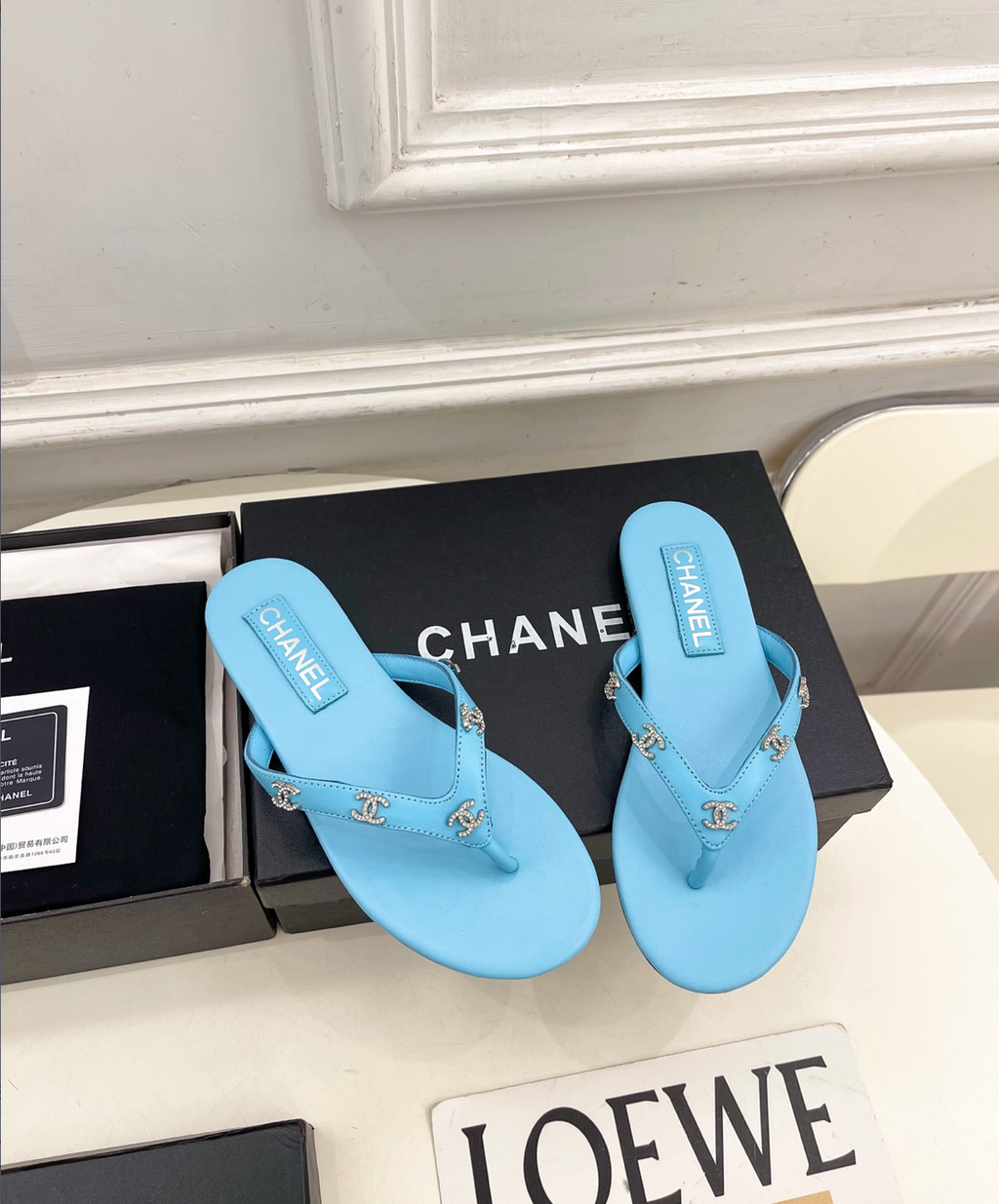 CHANEL Light Blue leather rhinestone thong sandals