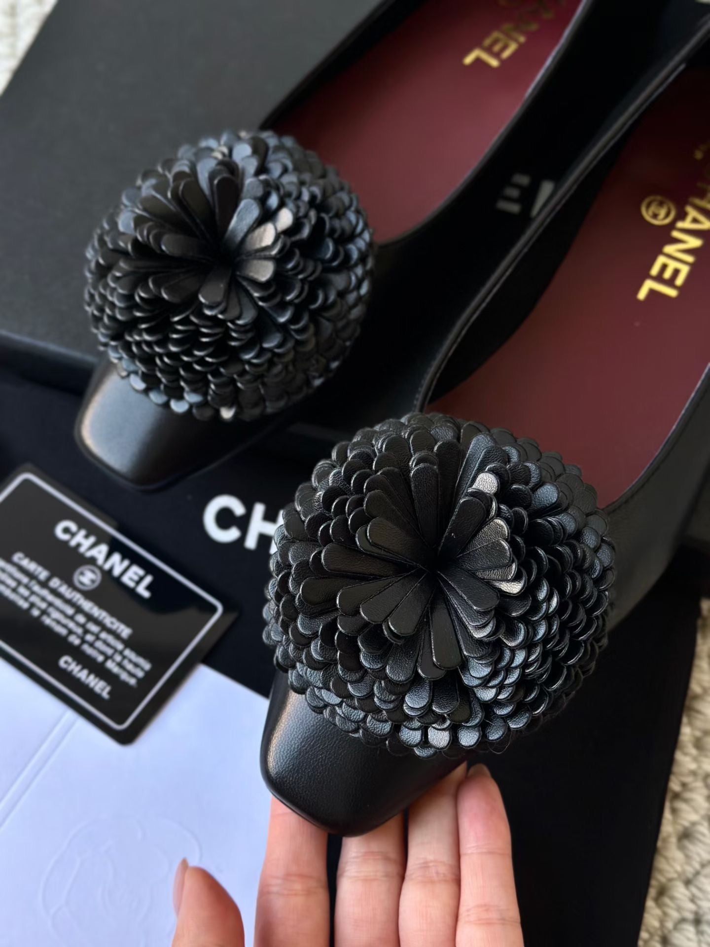 CHANEL Black Camellia SS26 Ballerina flats